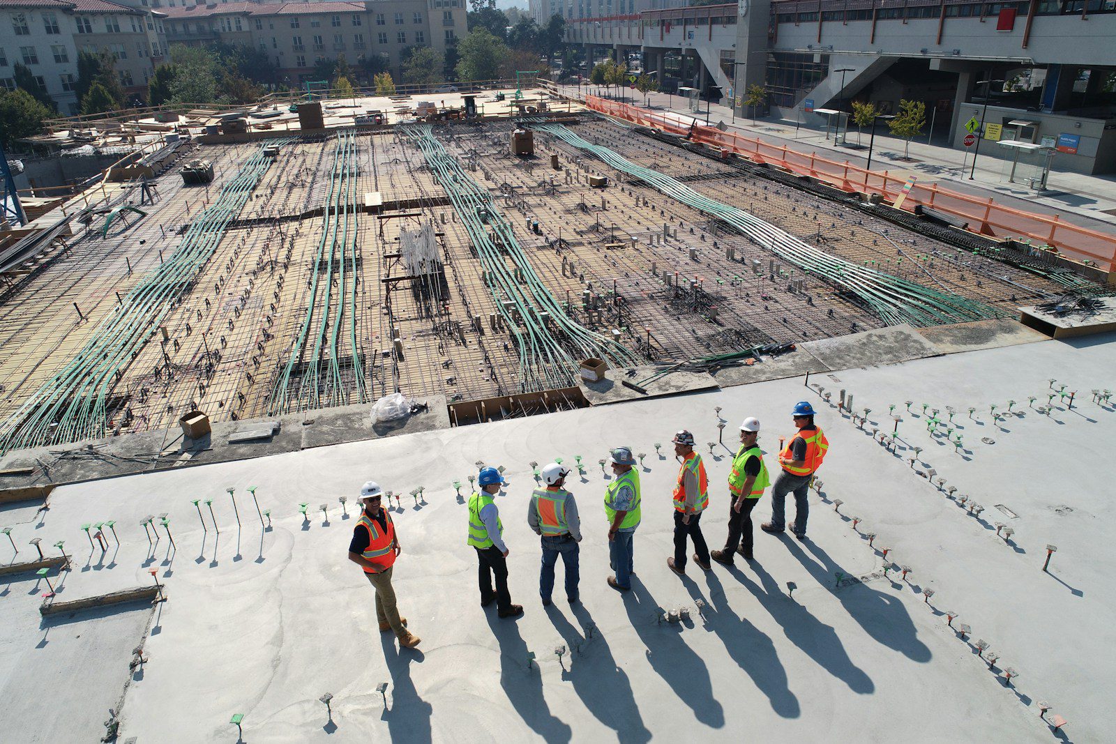 Strona główna seven construction workers standing on white field