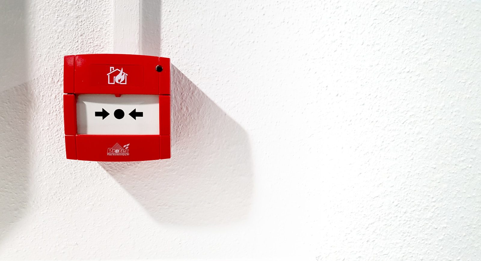 outlet attached on white wall